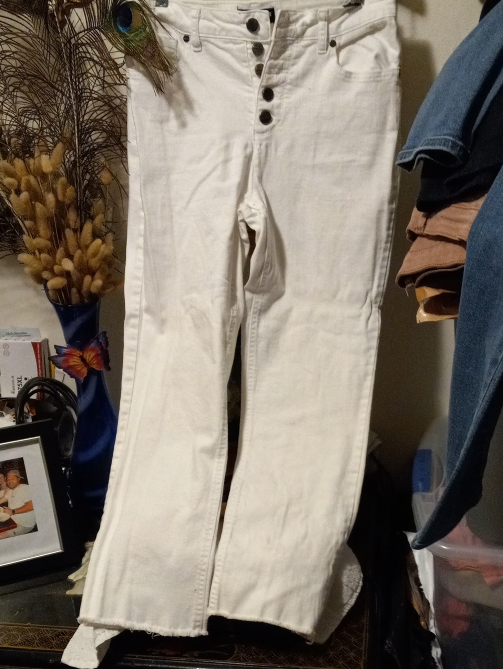 Kenneth Cole White Button-Fly Jeans With Raw Hem.
